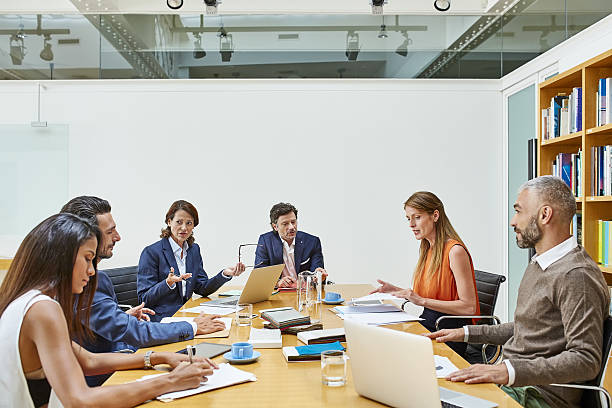 istock Sitting down to another serious meeting 638770576