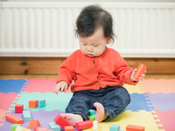 istock Asian baby playing building blocks 638771530
