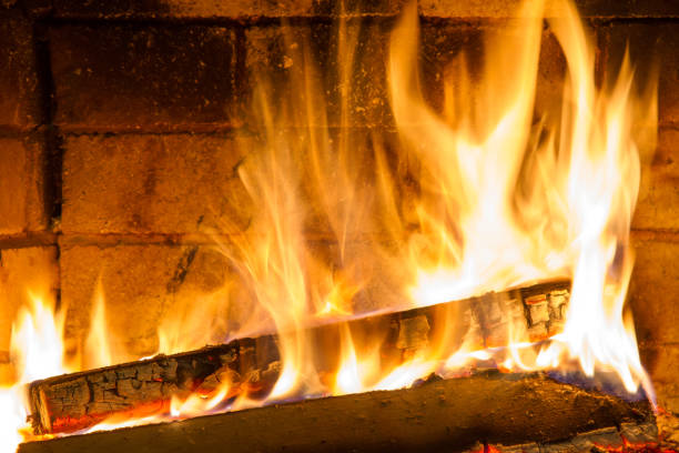 istock Burning firewood in the fireplace close up 638771958