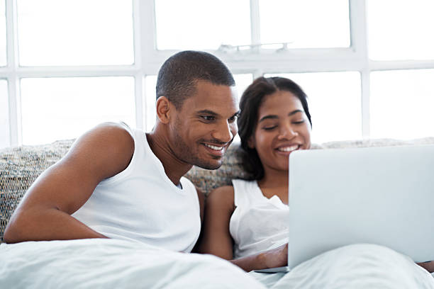 istock Chilling online together in bed 638773224