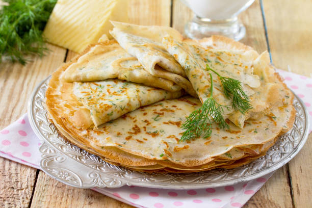 istock Not sweet pancakes with cheese and fresh dill 638775098