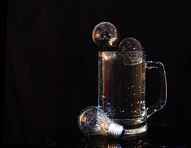 istock Glass of beer with bulbs 638781006
