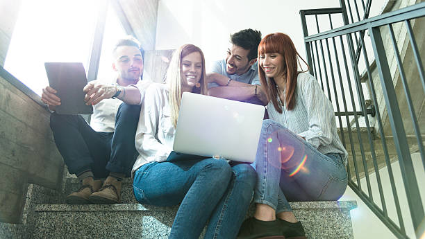 istock group of colleagues working on the steps 638785486