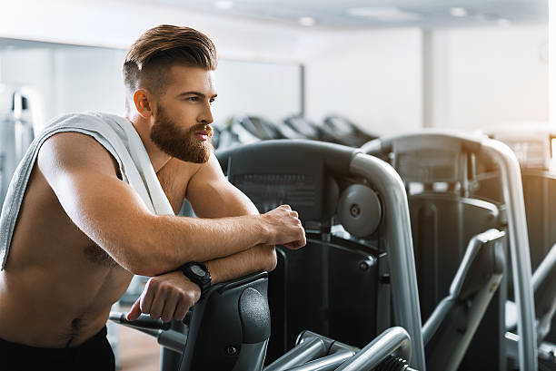 istock Thoughtful strong man in gymnasium 638785892