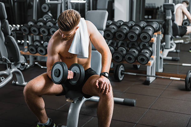 istock Powerful sportsman in modern gym 638787750