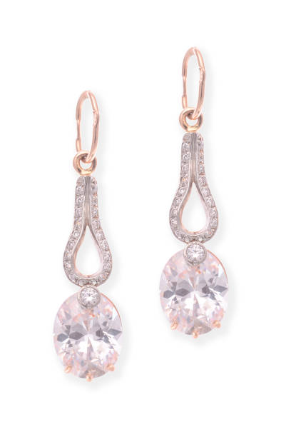 istock gold earrings with diamonds isolated on white 638788732