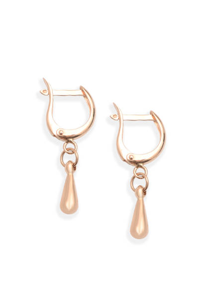 istock gold earrings isolated on white 638788906