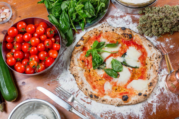 istock Traditional italian pizza with mozzarella, tomato and basil 638789978