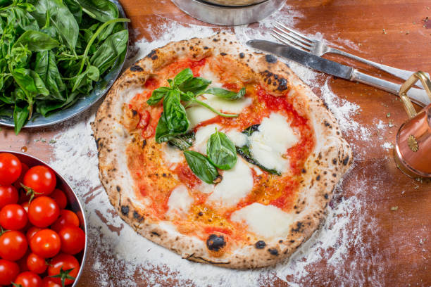 istock Traditional italian pizza with mozzarella, tomato and basil 638790066