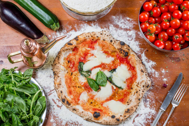 istock Traditional italian pizza with mozzarella, tomato and basil 638790232