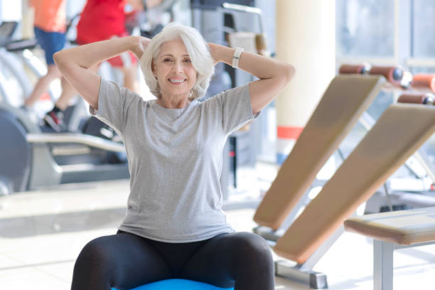 istock Smiling pretty gray haired having fitness. 638790414