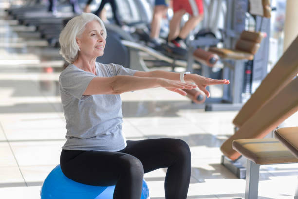 istock Happy fit smiling woman exercising and using  ball. 638790466