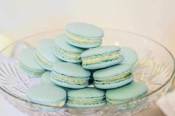 istock Beautiful blue macarons on glass plate 638790480