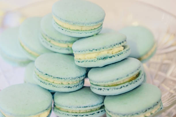 istock Beautiful blue macarons on glass plate 638790528