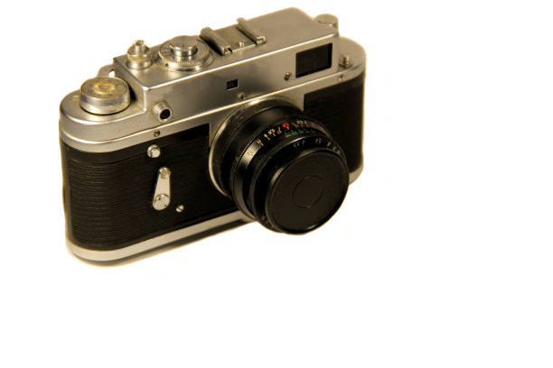 istock Retro photo camera isolated on white background 638790534