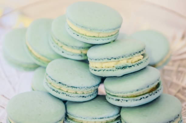istock Beautiful blue macarons on glass plate 638790578