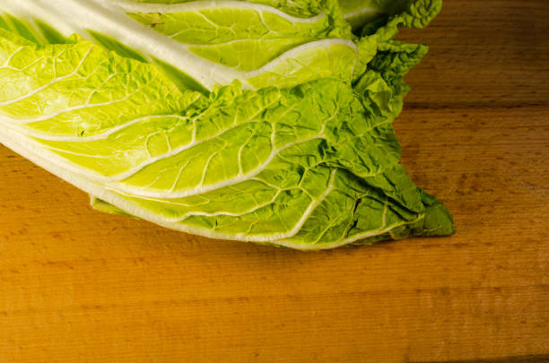 istock Chinese cabbage on a wooden table 638790726
