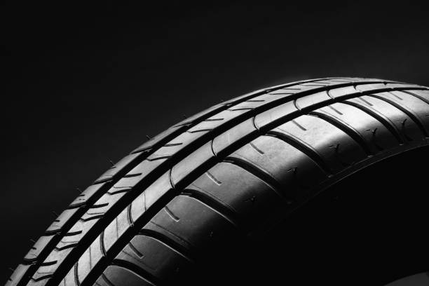 istock Summer fuel efficient car tire on black background 638790756
