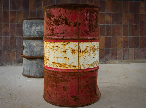 istock The old and rusty barrel against a wall 638790956