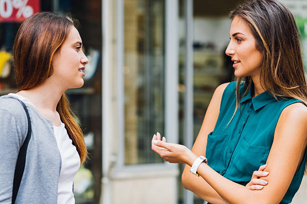istock Young women talking at the street 638791542