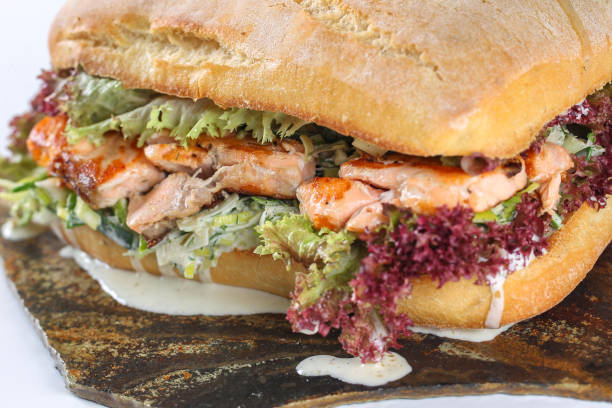 istock Tasty salmon steak sandwich in a ciabatta 638792374