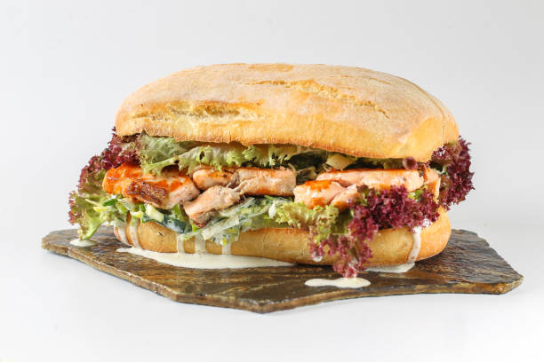 istock Tasty salmon steak sandwich in a ciabatta 638792420
