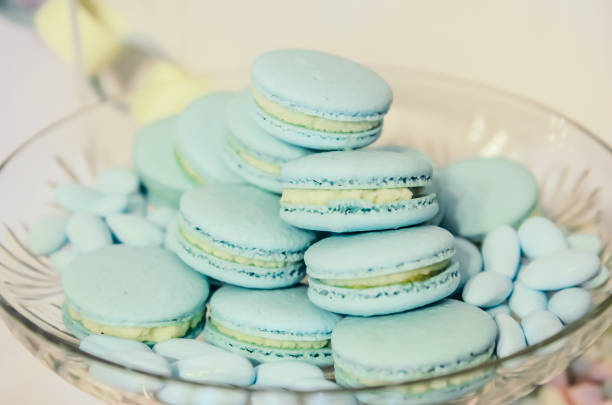 istock Beautiful blue macarons on glass plate 638792574