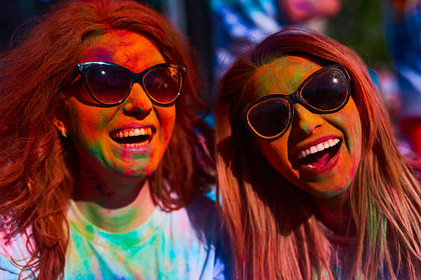istock friends at colorful party 638794998