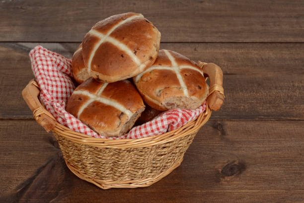 istock wicker basket of hot cross buns 638795512