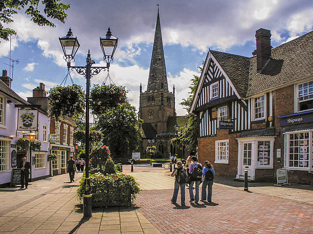 solihull town centre west midlands uk Solihull, UK - September 20, 2016: This is the town centre of Solihull in the West Midlands, England, UK. It is a sunny afternoon in late September and there are people walking around the streets and pedestrianised squares of the town. west midlands photos stock pictures, royalty-free photos & images
