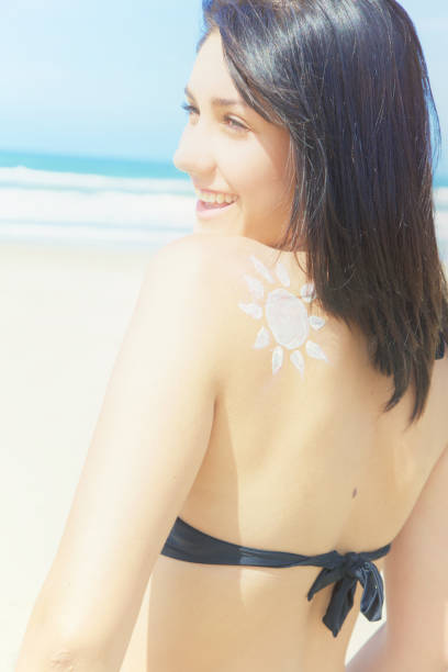 istock Cute young female model in bikini smiling happy 638798686