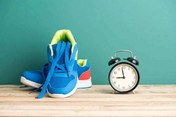 istock Clock and Sneakers - Fitness Concept 638800598