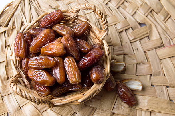 istock Dried date fruits in a bowl 638805192