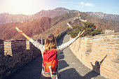 Young woman embracing nature-Great Wall of China