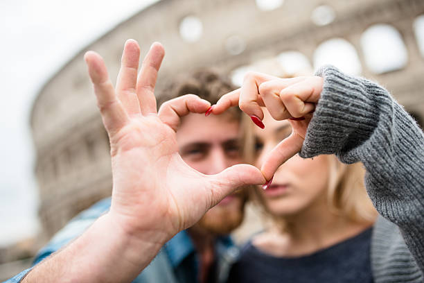 istock romantic couple doing the heart shape in Roma 638808462