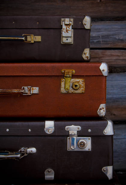 istock Vintage suitcases of different sizes and colors are on each 638808524