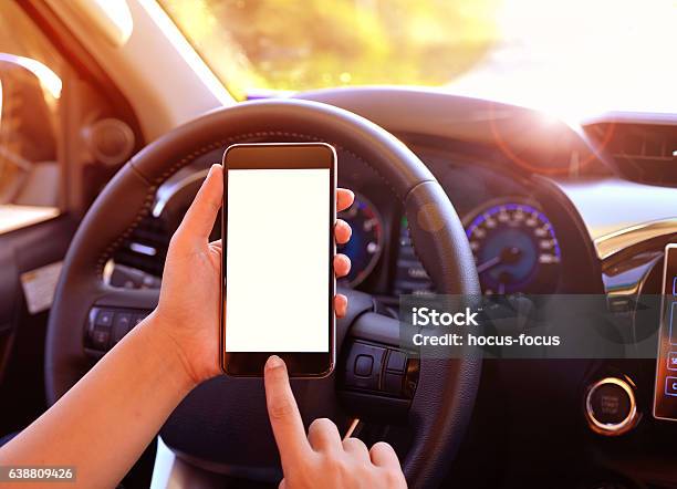 Using Smart Phone In Car Stock Photo - Download Image Now - Car Rental, Mobile App, Adult