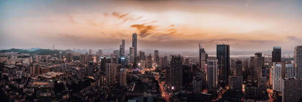 beautiful sunset in downtown city beautiful sunset in the downtown city shenyang stock pictures, royalty-free photos & images