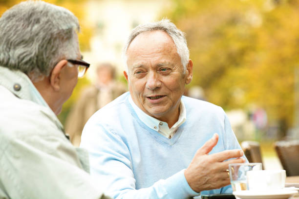 istock Senior friends enjoying outside 638813840