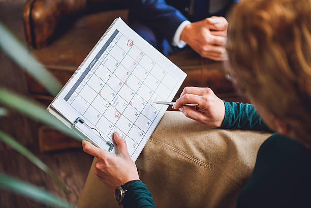 istock Female psychologist holding calendar 638815078