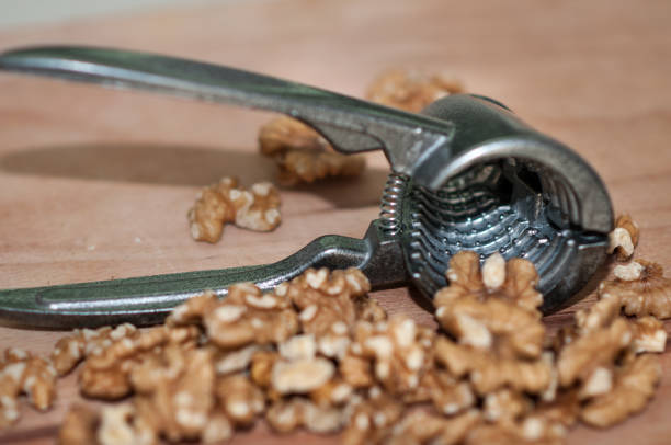 Crushed walnuts on a wooden table