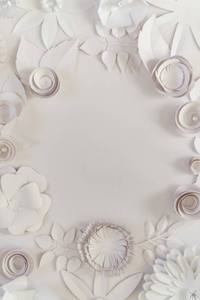 istock Round frame with white paper flowers 638817694