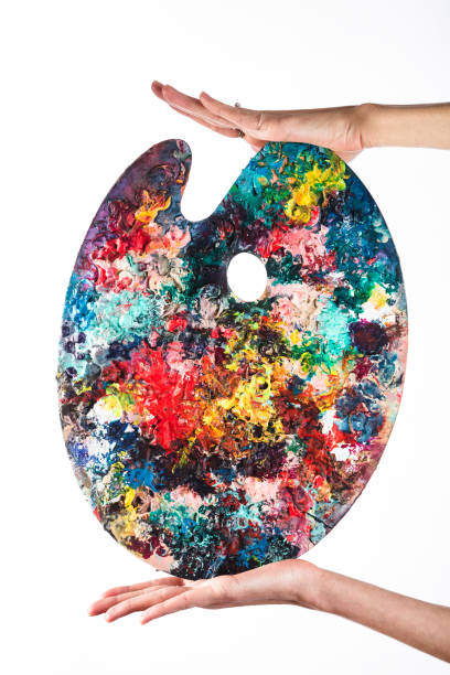 istock The artist's palette stained with paint. On a white 638819062