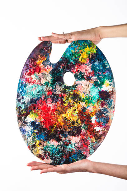 istock The artist's palette stained with paint. On a white 638819172