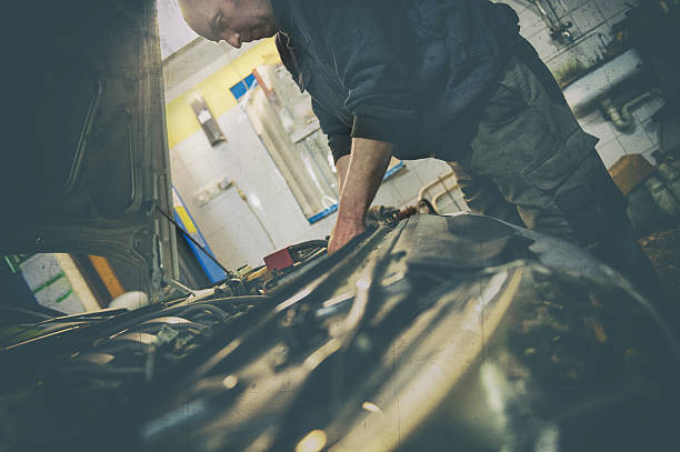 istock Car mechanic repair an engine 638819198
