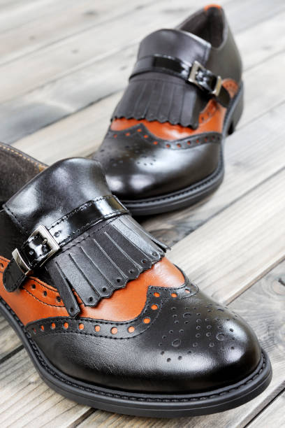 istock Women's shoes on old wooden table. 638820568