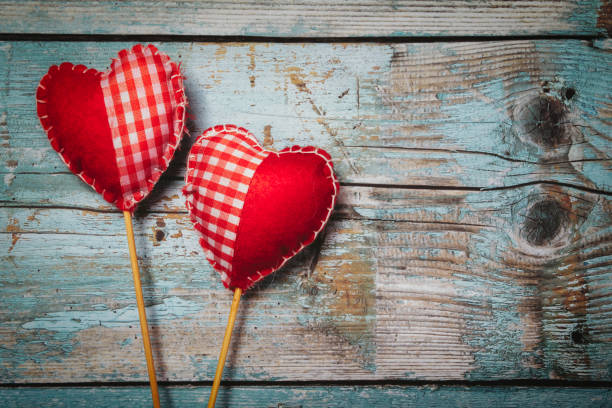 istock Valentines day hearts on wooden background 638820898