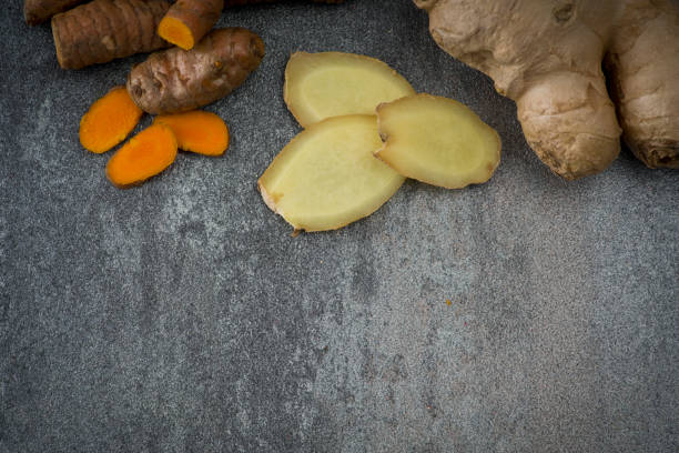 istock turmeric slices and ginger root sliced 638821460