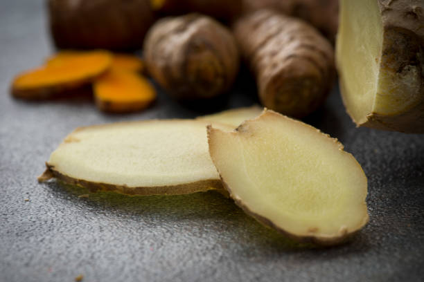 istock turmeric slices and ginger root sliced 638821650