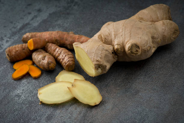 istock turmeric slices and ginger root sliced 638822648